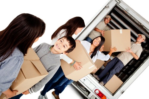 Friendly staff assisting customers at Storage Colliers Wood