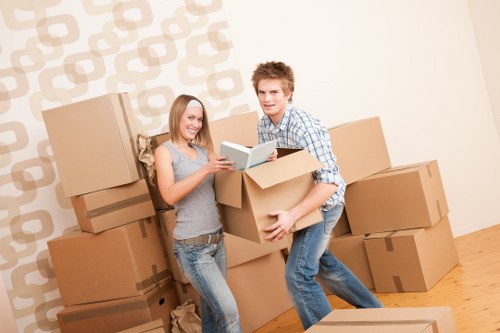 Professional movers handling furniture